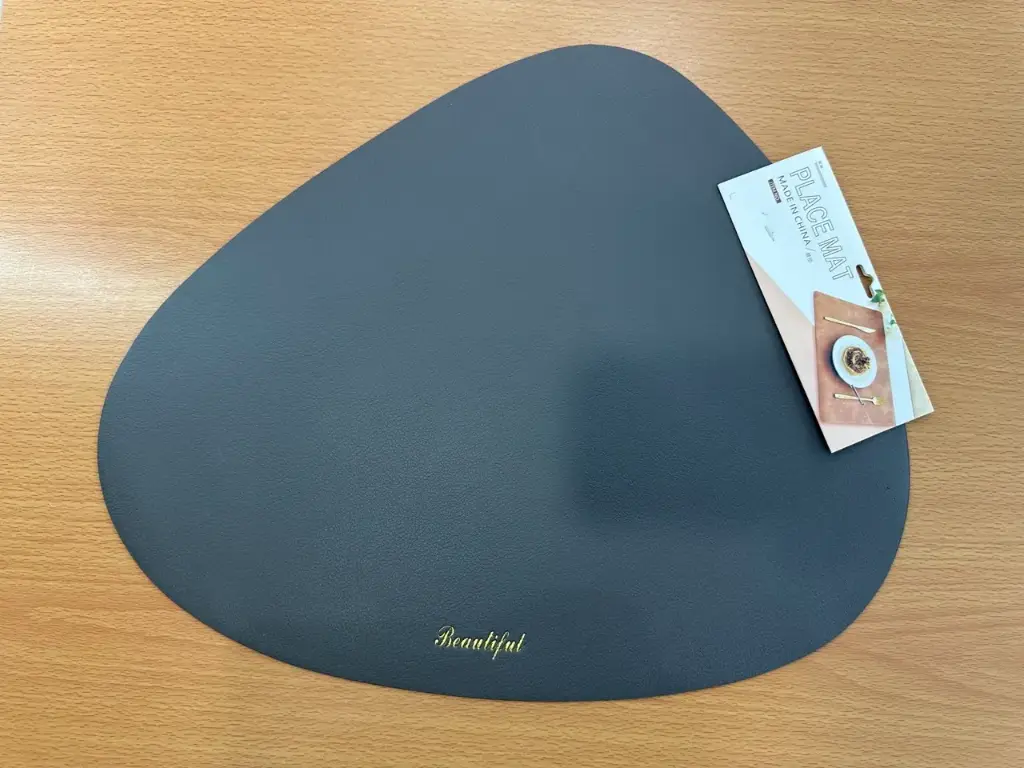 ON-5633 – Teardrop-Shaped PVC Placemat (Dark Gray) 